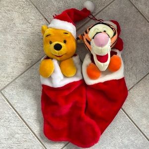 Two Christmas stockings : Winnie the Pooh and Tiger.